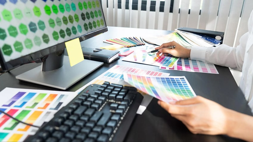 A designer choosing colors for a project 
