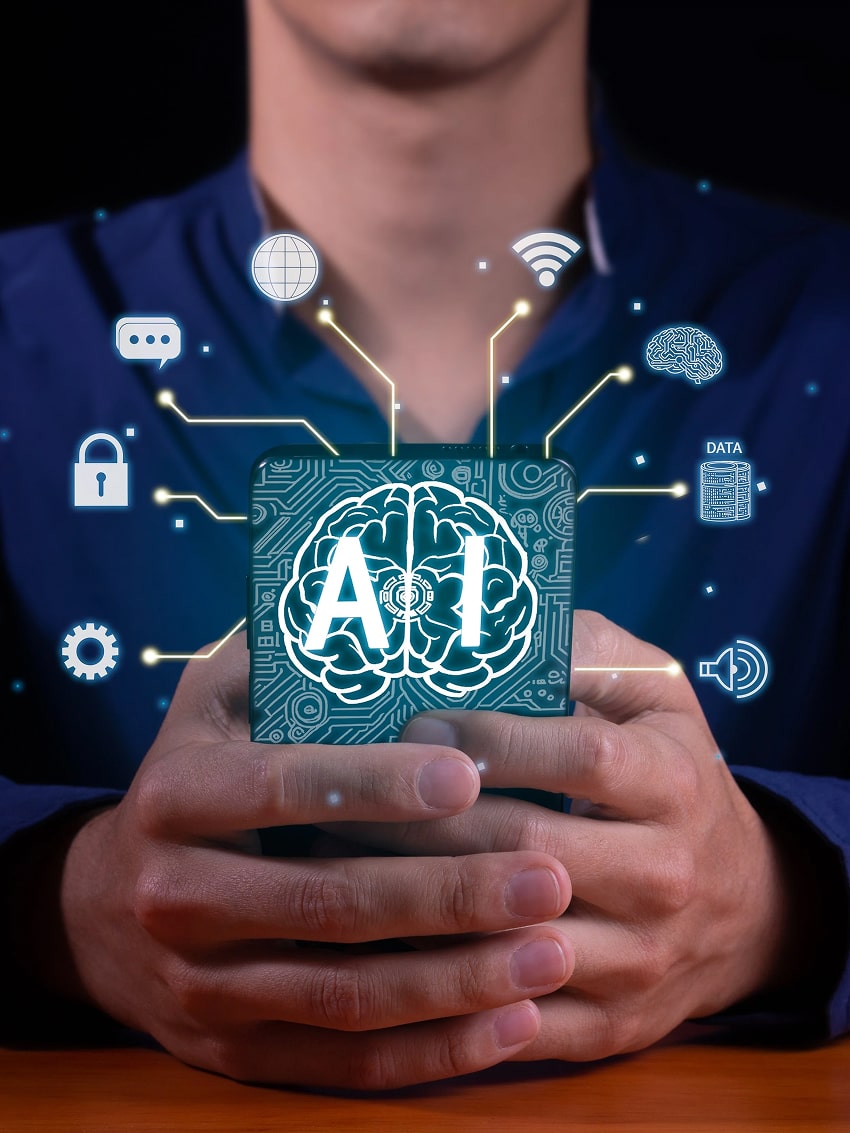 Close-up photo of a hand holding a smartphone displaying management icons Close-up photo of a hand holding a smartphone displaying management icons