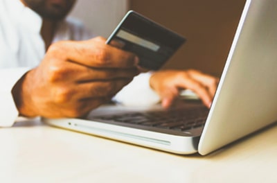 Paying online. Image source: https://unsplash.com/photos/Q59HmzK38eQ 