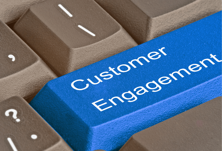 A keyboard key labeled "Customer Engagement"
