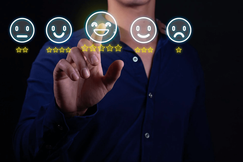 Customer satisfaction rating with a person clicking on a five star emoji.